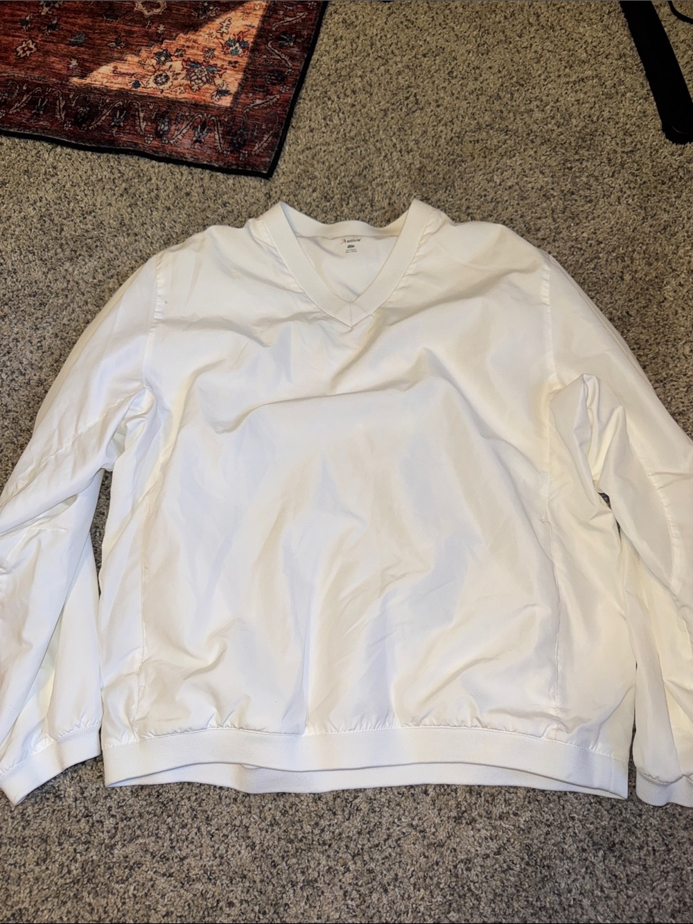 Ativa White V-Neck Lightweight Women's windbreaker.